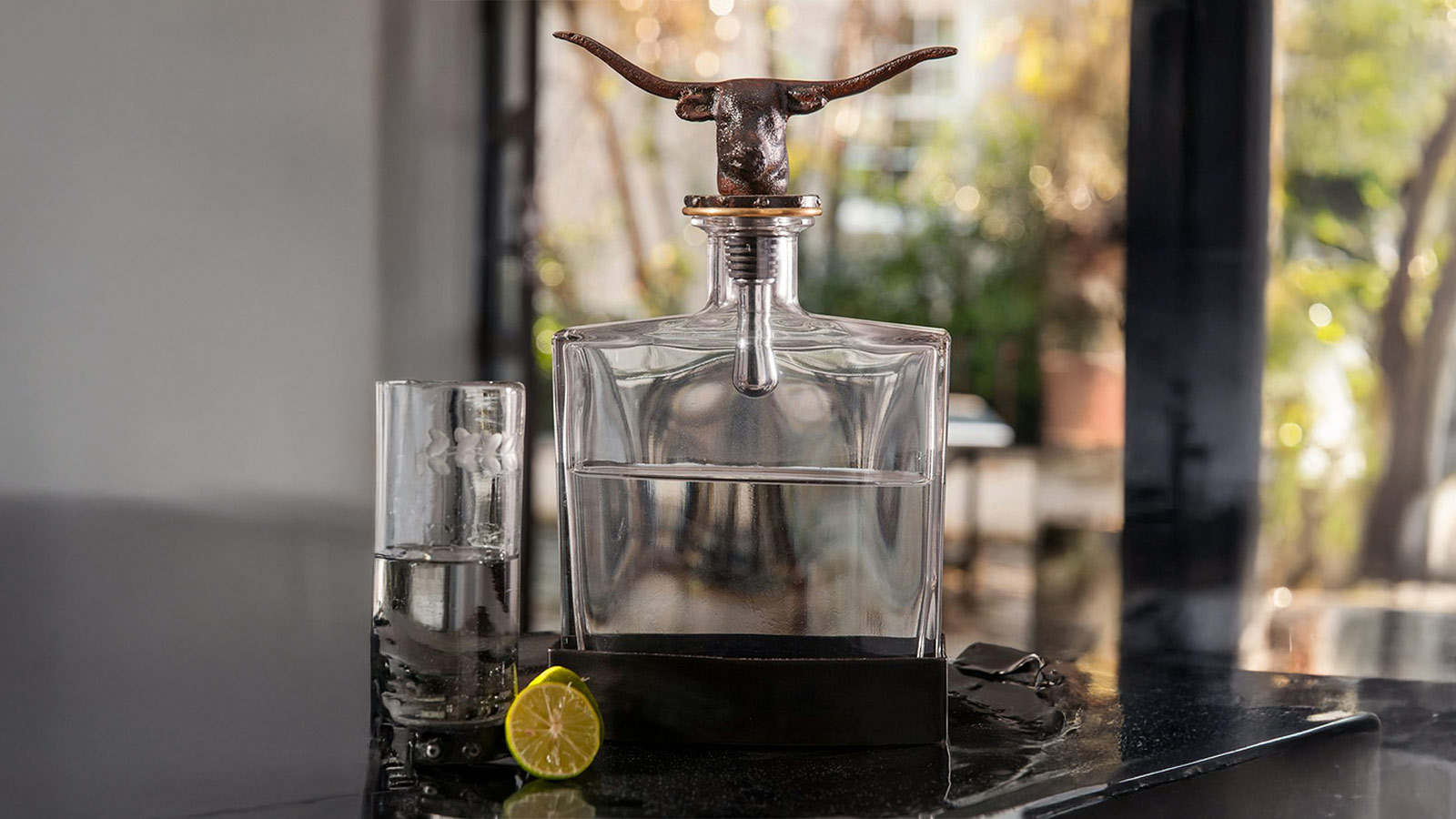 Handcrafted Jan Barboglio whiskey decanter with sculpted bull topper — a luxury pick for the Best Whiskey Gifts for Men 2025.
