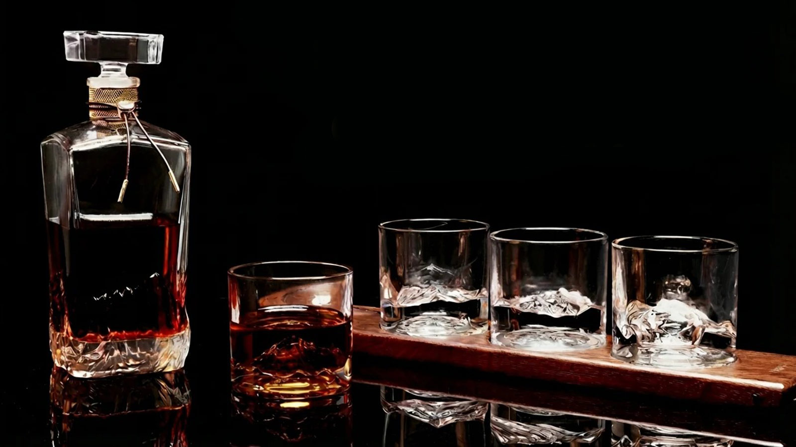 Carved crystal Liiton whiskey glasses with textured mountain detailing — a refined choice for the Best Whiskey Gifts for Men 2025.