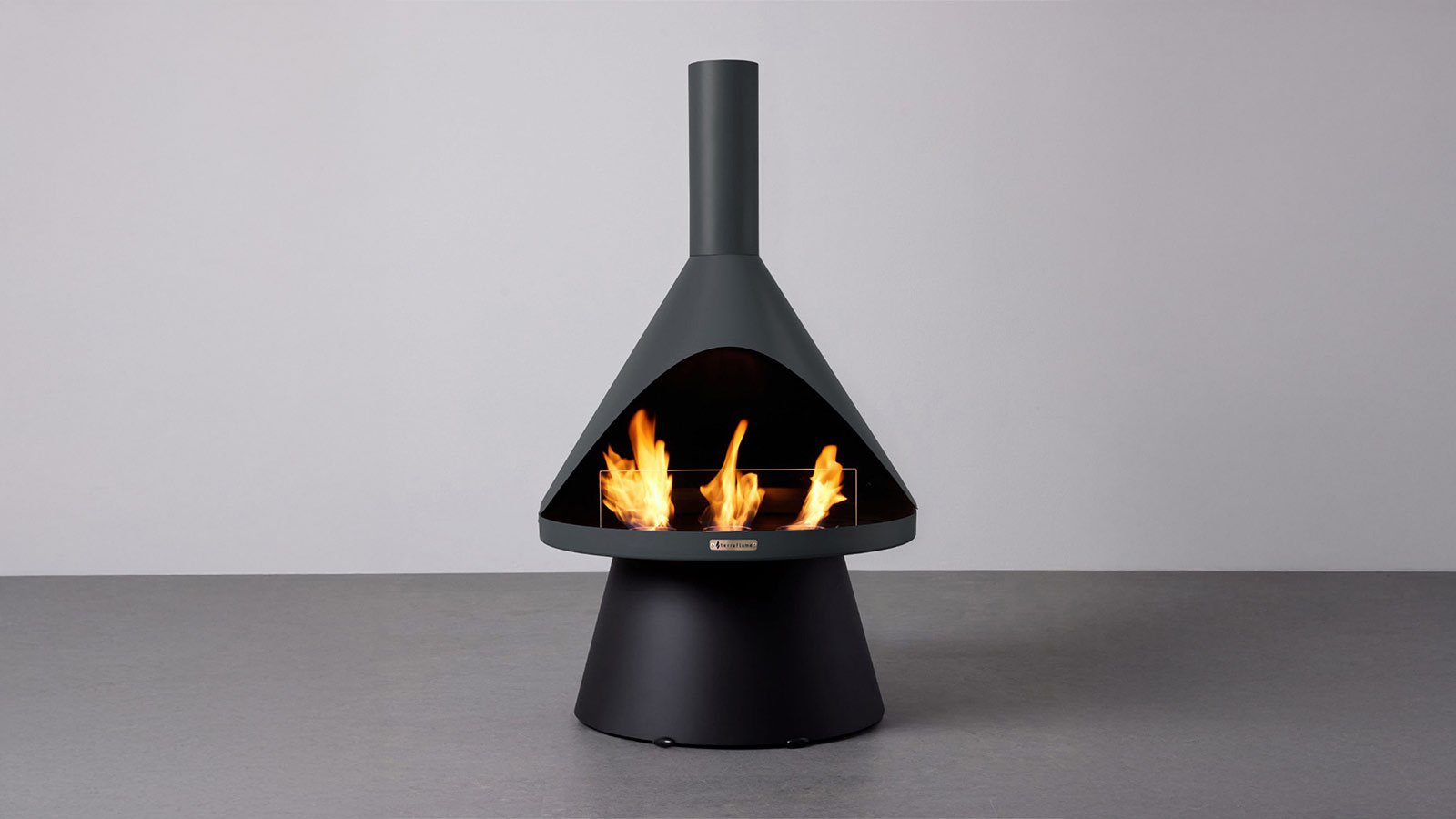 Modern TerraFlame Lloyd fireplace with clean cone-shaped design, a standout piece for the Best Indoor Gifts for Men.