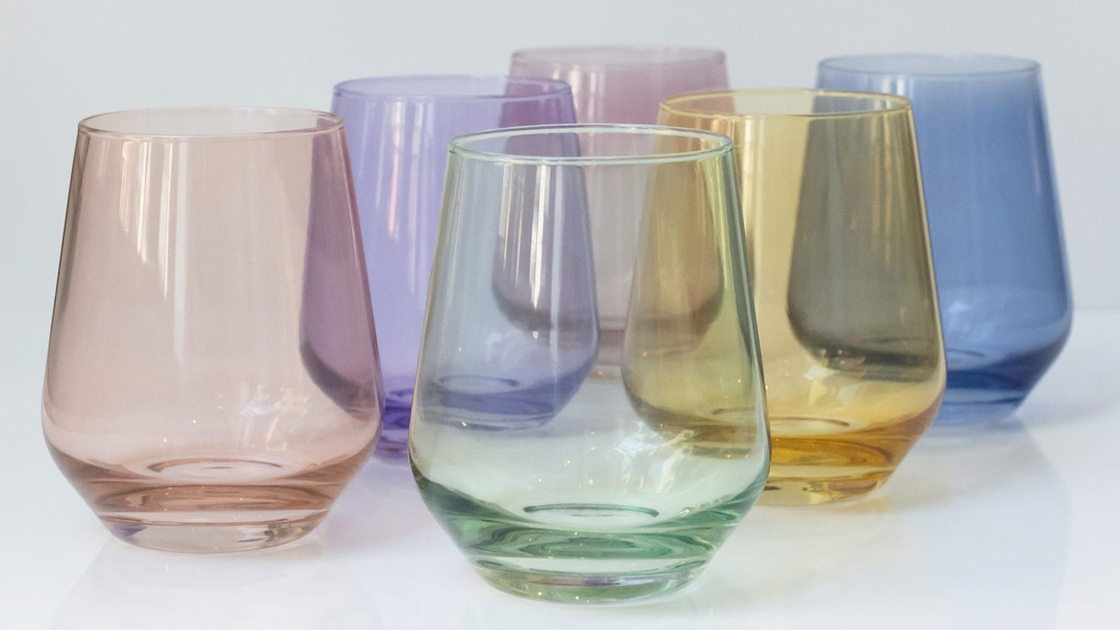 Pastel-colored stemless wine glasses, a vibrant and elegant pick among the best holiday gifts for women