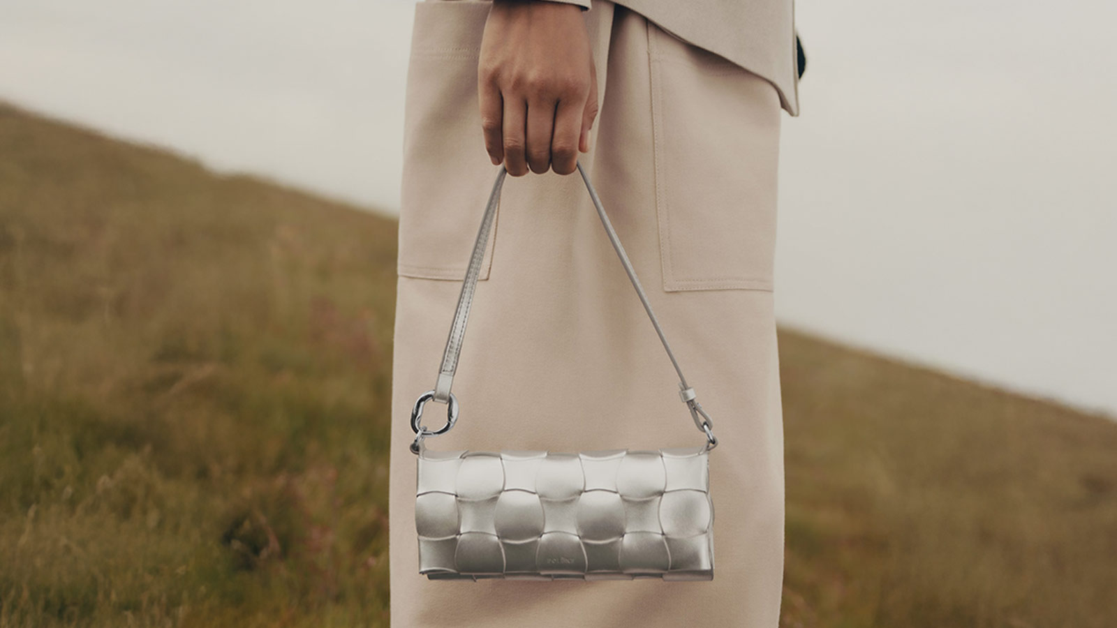 Polène Neiti silver shoulder bag with sculptural texture – a standout accessory in the best holiday gifts for women