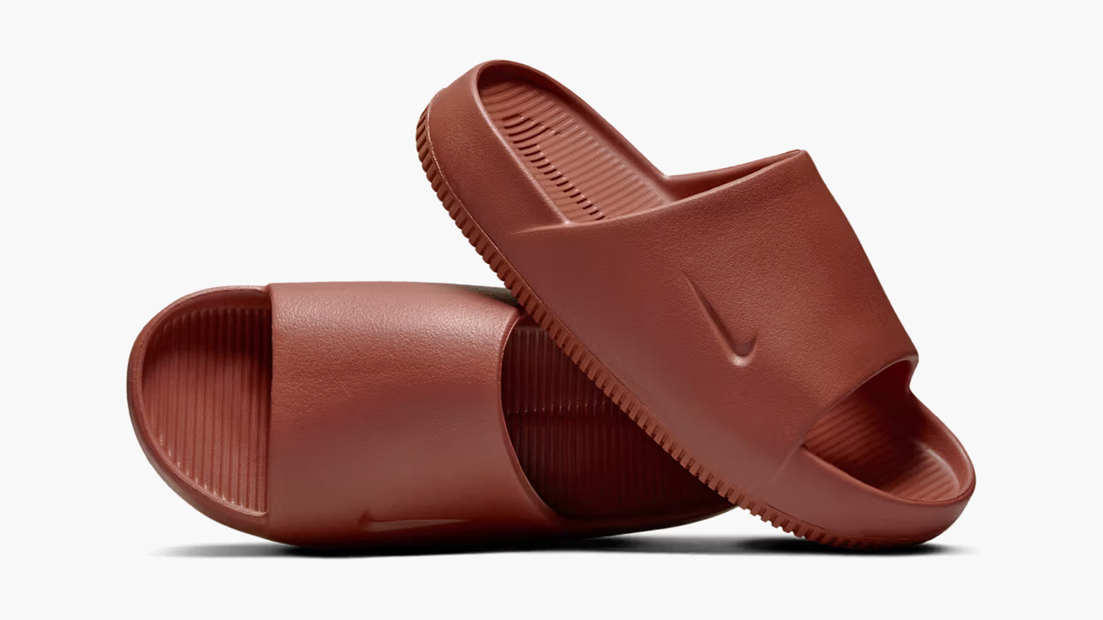 Nike Calm Slide in Rugged Orange