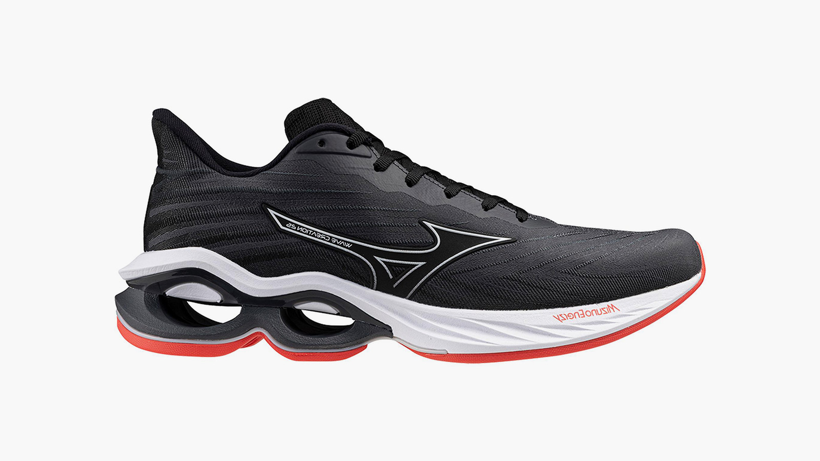 a black men's running shoe with a white and red sole