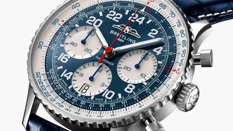 Breitling's Navitimer B02 Chronograph 41 boasts a platinum case and red chronograph accents.