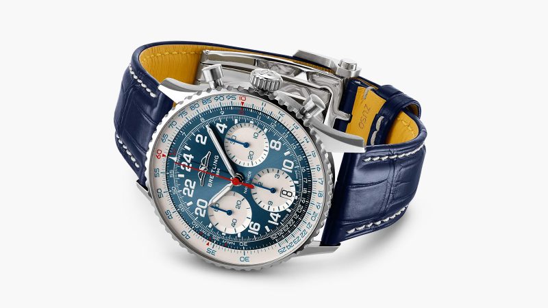 Breitling's Navitimer B02 Chronograph 41 boasts a platinum case and red chronograph accents.