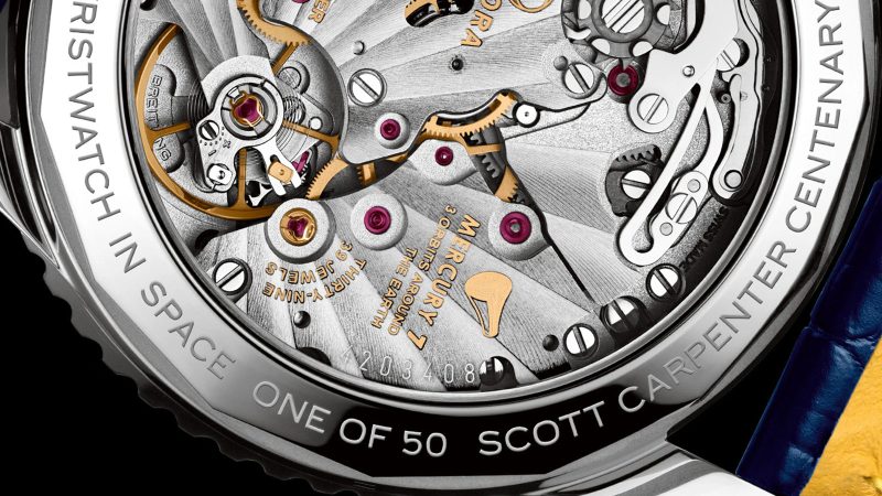Breitling's Navitimer B02 Chronograph 41 boasts a platinum case and red chronograph accents.