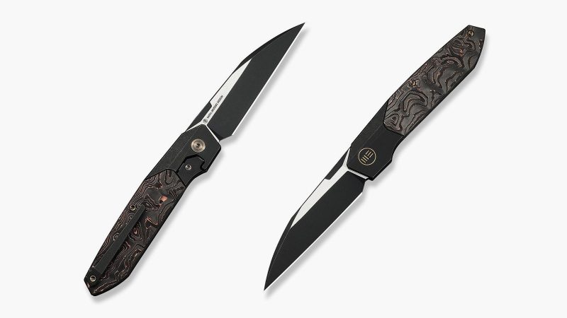 The WEKNIFE Brr15 has a rugged black titanium frame inlaid with copper foil.