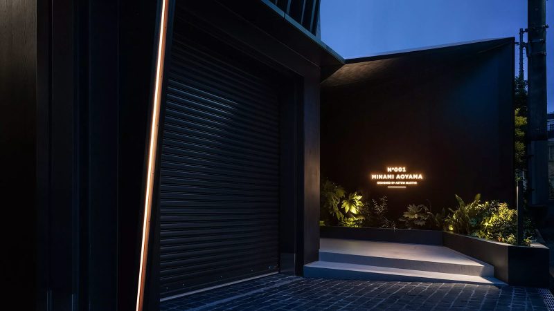 Aston Martin’s N°001 Minami Aoyama is a four-story Tokyo townhouse with vertical metal louvers and sculptural design by Aston Martin and VIBROA.