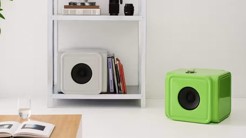 Caliper x Alaska Alaska AA67 sculptural bookshelf speaker in bold color with curved, kiosk-inspired design.