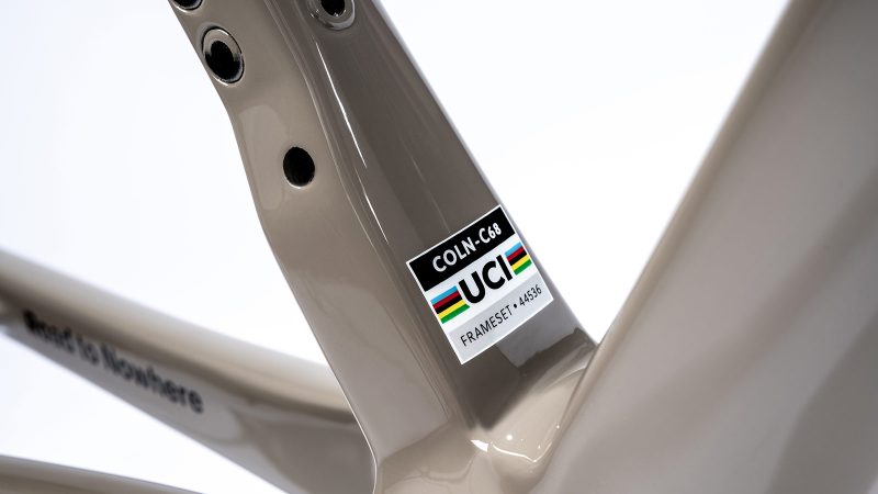 The Colnago C68 x Pas Normal Studios Bicycle boasts a carbon fiber frame, an aerodynamic design, and high-performance Italian craftsmanship, all complemented by minimalist styling.