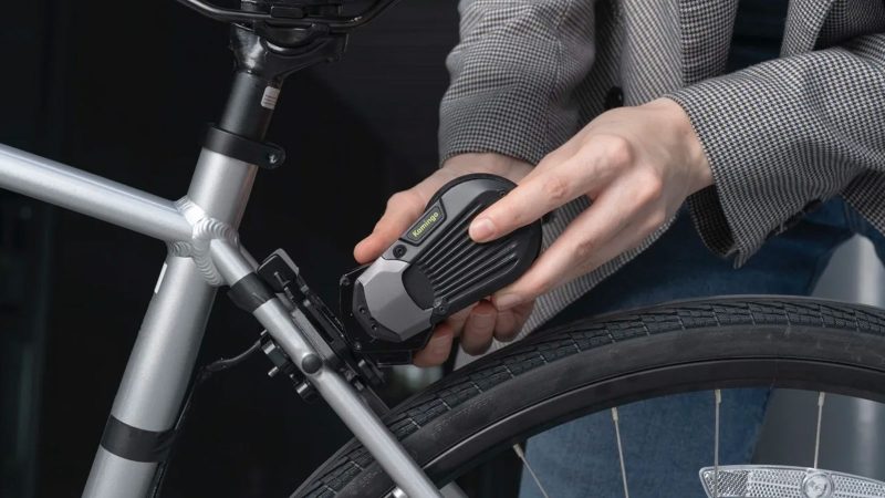 The Kamingo e-Bike Converter kit attaches to the rear wheel via handlebar control and features a bottle-shaped battery, making it ideal for commuter bicycles.