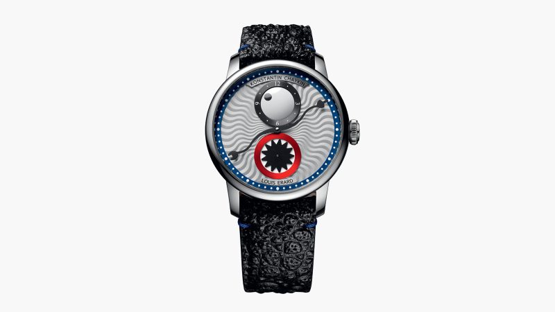 The Louis Erard x Konstantin Chaykin Time Eater III watch features a cyclops eye hour disc, a teethy seconds subdial, a devil-horned minute hand, a polished steel case, and an enamel Regulator layout.