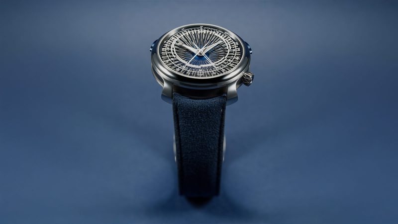 The MING 20.01 Series 5 features a laser-milled blue titanium radial dial, central chronograph hands, a polished steel and DLC titanium case, and a dark blue strap.