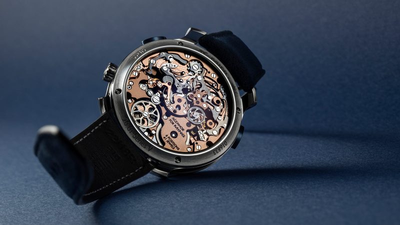 The MING 20.01 Series 5 features a laser-milled blue titanium radial dial, central chronograph hands, a polished steel and DLC titanium case, and a dark blue strap.