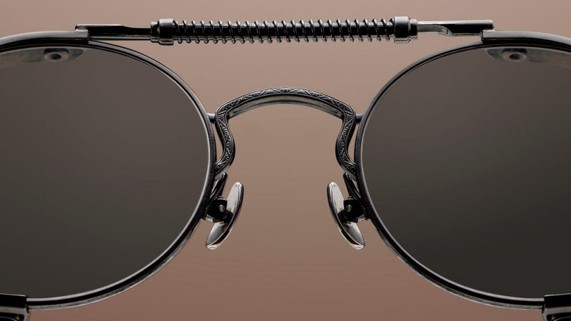 Matsuda's Heritage Collection 2809H-V2 round sunglasses feature titanium frames, Japanese acetate, and side shields.