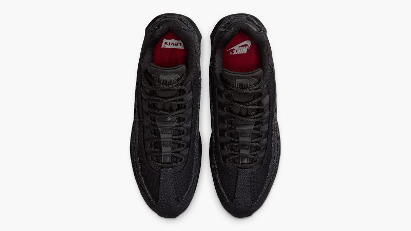 Levi’s x Nike Air Max 95 sneakers in denim with frayed edges, co-branded red accents, and matching relaxed jeans and denim jacket from the collection.