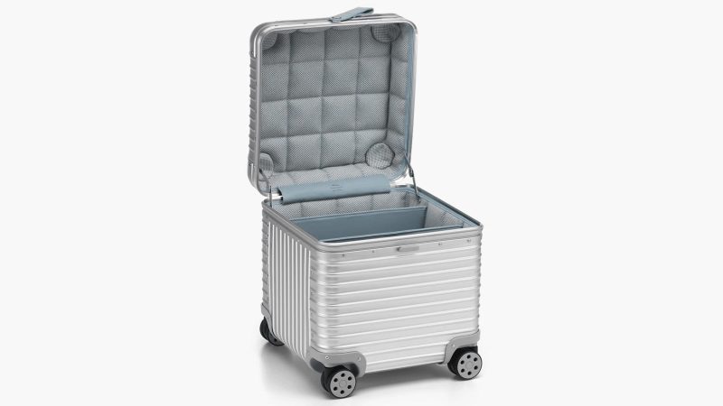 The RIMOWA x Vitra Aluminum Stool is a design-forward storage seat.