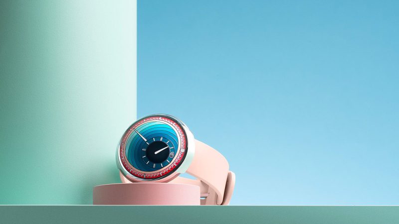 Ressence Type 8 DE1 & DE2 Art Watches — pebble-shaped grade 5 titanium cases with sculptural gradient “Inside Out” dials in pink (DE1) and turquoise (DE2) rubber straps.