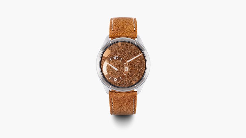 Ressence TYPE 9 S75 boasts a real desert sand dial, a titanium case, and a camel leather strap.