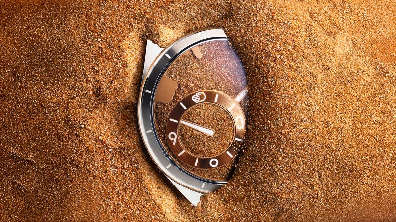 Ressence TYPE 9 S75 boasts a real desert sand dial, a titanium case, and a camel leather strap.