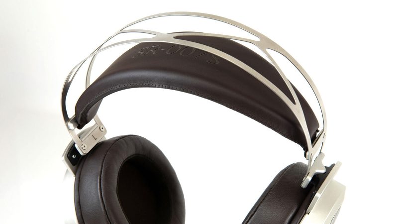 STAX SR-007S electrostatic earspeakers feature upgraded diaphragms, stainless steel anti-resonance structure, and sheepskin earpads for audiophile clarity.