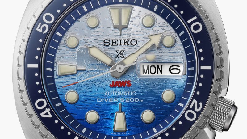 Seiko JAWS 50th Anniversary Limited Edition Prospex Turtle SRPL81K dive watch with silver-to-blue gradient shark dial, ceramic bezel, and a 45mm case to celebrate the iconic 1975 thriller film.