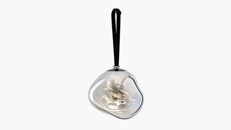 Tom Dixon's Melt Portable Lamp features a reflective mirror-finish shade, and a tripod base.