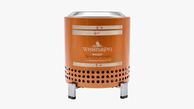 WhistlePig's CampStock Campfire Kit features wheat whiskey, a custom Solo Stove, and whiskey barrel firewood.