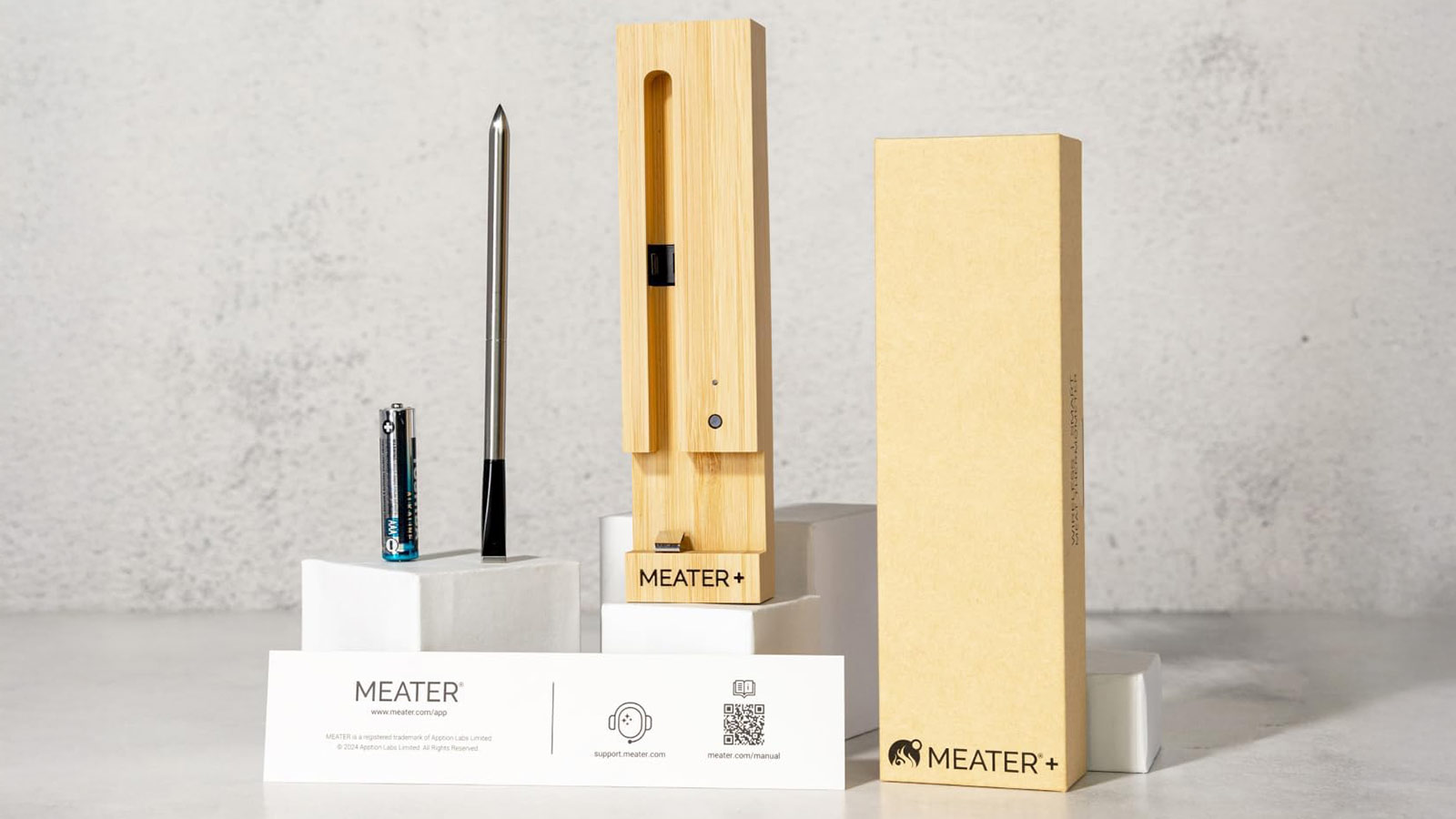 MEATER Plus wireless meat thermometer with bamboo charging case—smart tech that belongs in every best grilling tools lineup.