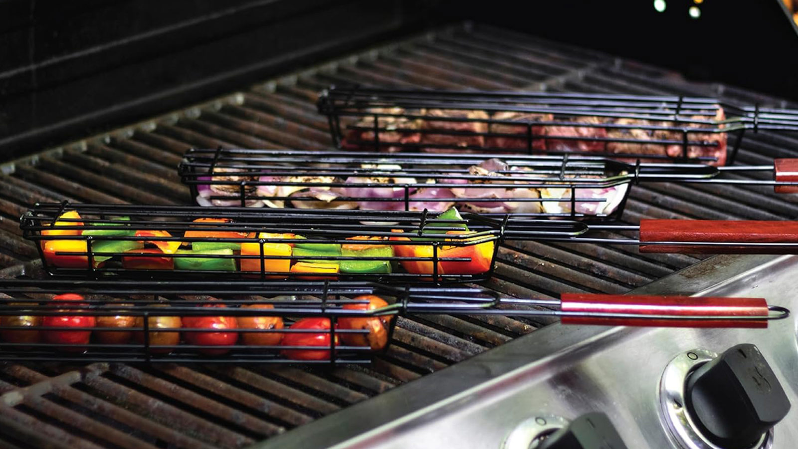 Nonstick kabob grilling baskets filled with vegetables and meat—versatile essentials among the best grilling tools for easy skewering.