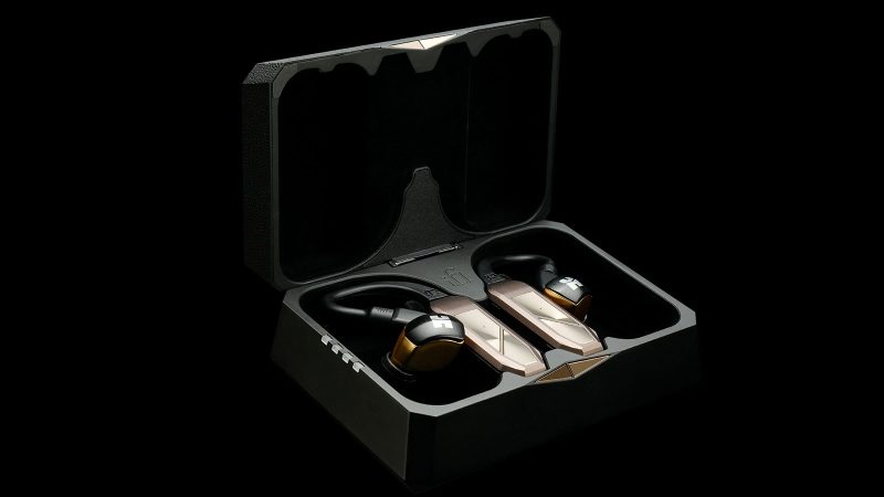 iFi GO Pod Max wireless earbuds with ergonomic stems and charging case, emphasize long battery life, ANC, and hi‑res audio capabilities.
