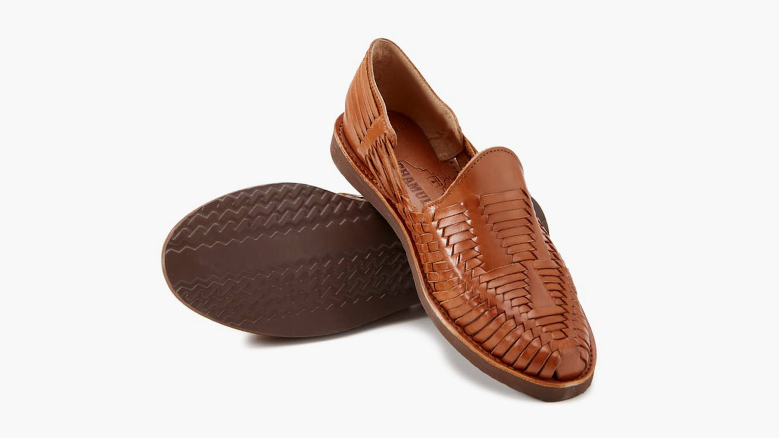 Woven leather huarache slip-on with rubber sole, representing timeless craftsmanship in men’s best slip-on shoes.