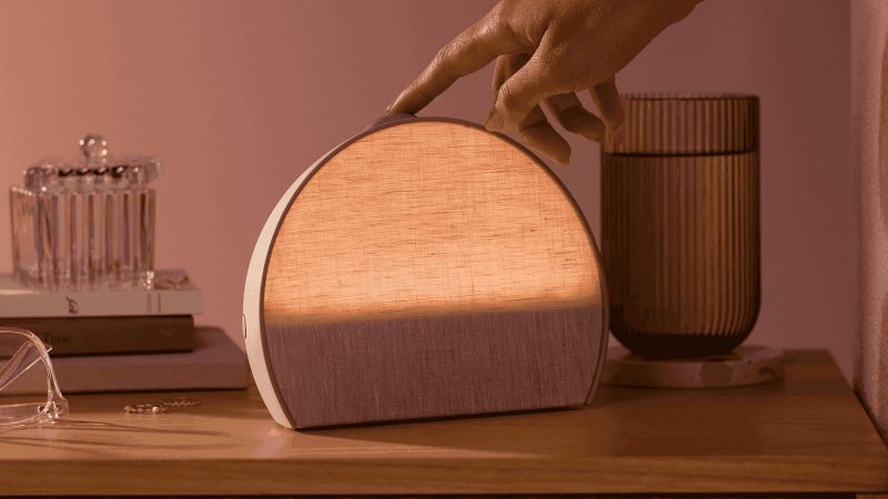 Hatch Restore wake-up light used in a calm, intentional morning routine for men.