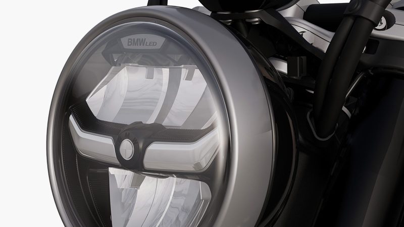 The 2026 BMW R 12 motorcycle with retro cruiser styling, low-slung frame, high-torque engine, and modern engineering for aggressive street performance.