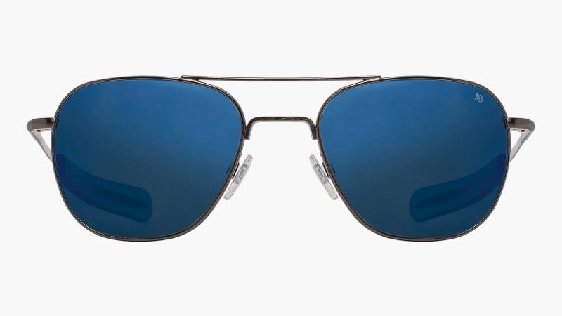 Limited-edition American Optical Original Pilot “Blue Moon” sunglasses featuring silver-aged antique frames and deep blue SunFlash mirror lenses.