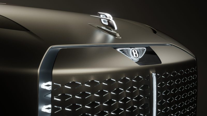 The Bentley EXP 15 all-electric concept GT has a three-seat layout, asymmetrical doors, a luxury retro-modern interior, a robot-inspired front grille, and a Champagne-ready trunk.