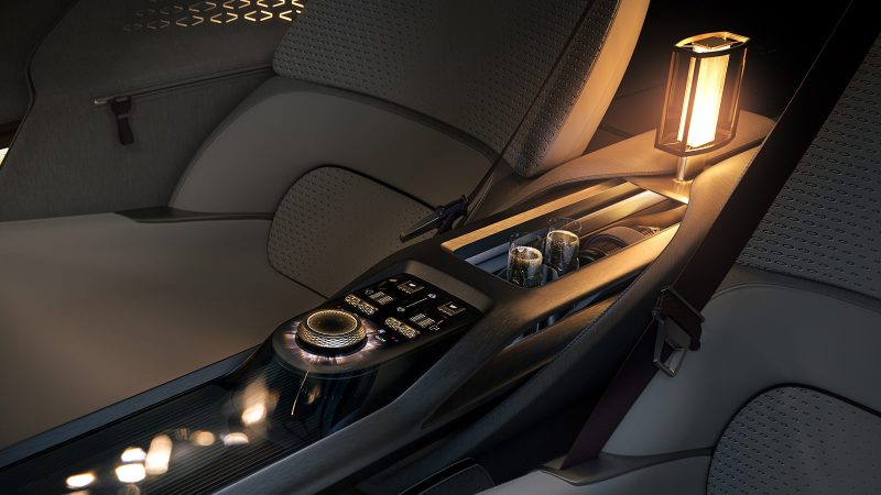 The Bentley EXP 15 all-electric concept GT has a three-seat layout, asymmetrical doors, a luxury retro-modern interior, a robot-inspired front grille, and a Champagne-ready trunk.