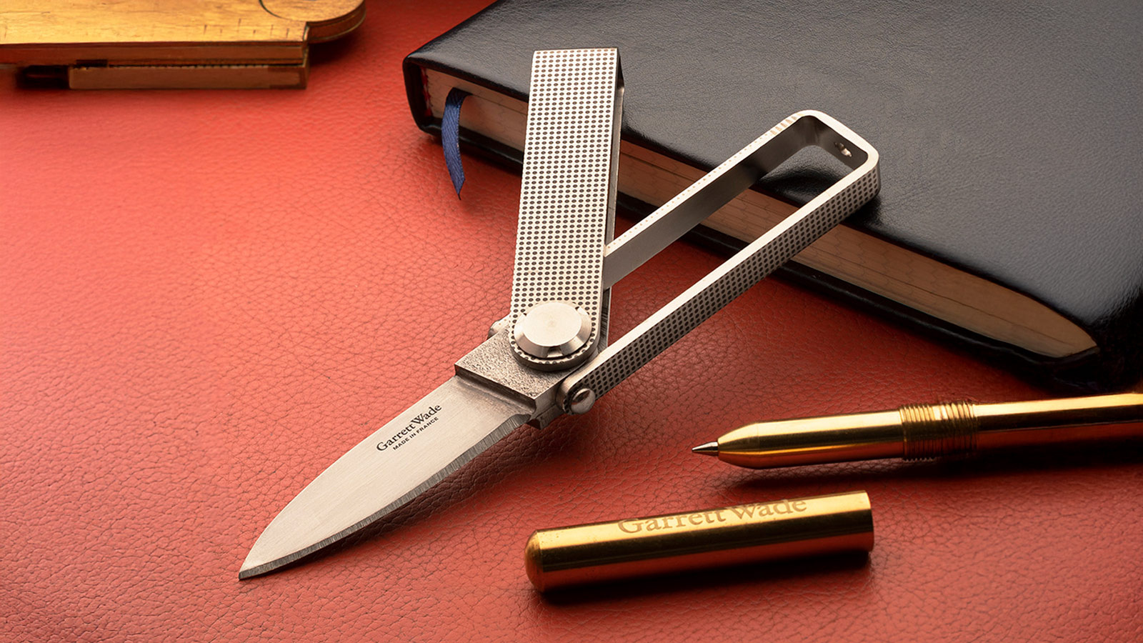 Garrett Wade bifold pocket knife with textured handle, featured in the Best EDC Knives for Men 2025.