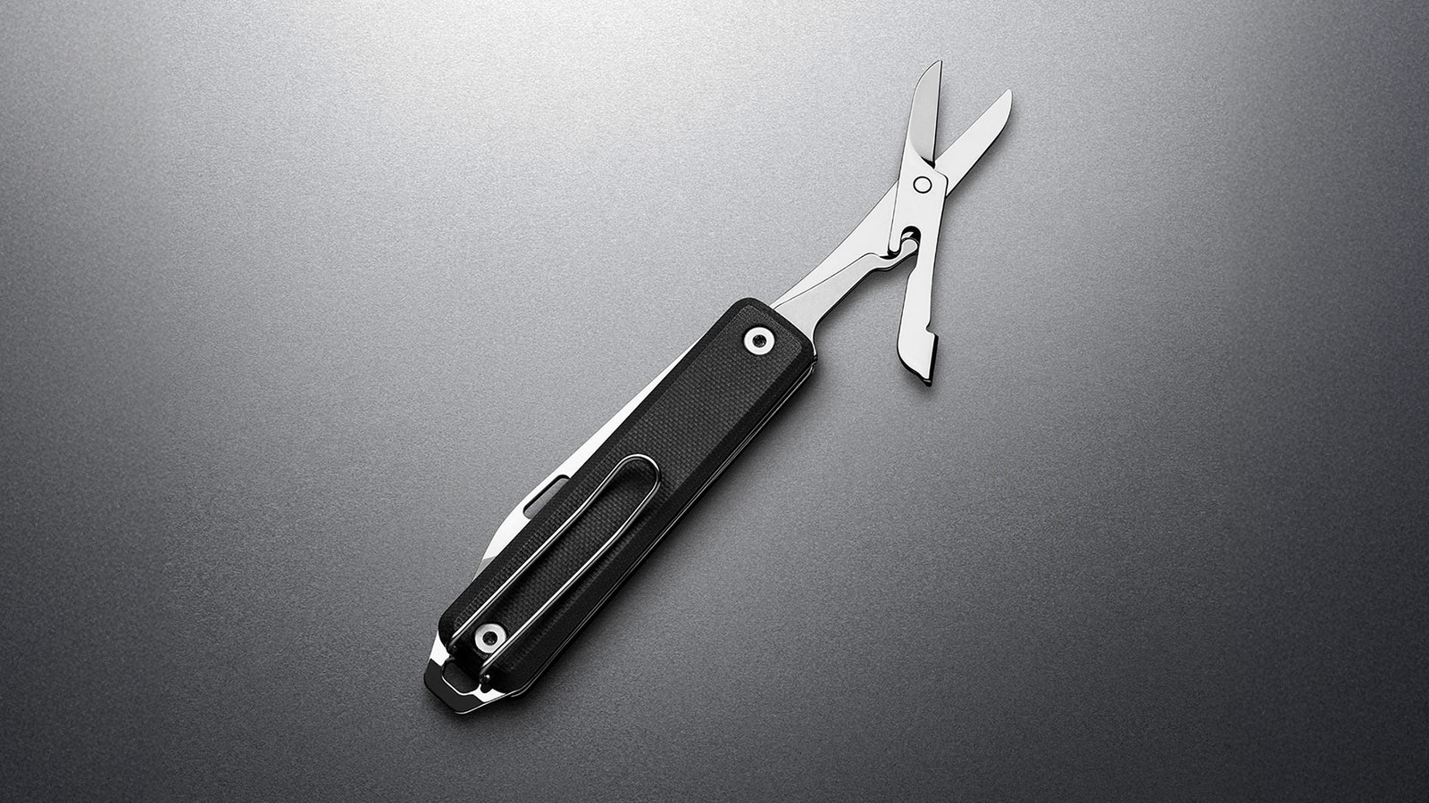 The James Brand Ellis multitool knife with open scissors, versatile gear in the Best EDC Knives for Men 2025.