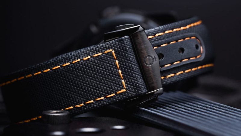 Bōken x Blackeye Phantom Breacher GMT watch featuring a black DLC-coated case, Swiss Sellita movement, orange lume, and a limited run of 42 pieces for a rugby charity.
