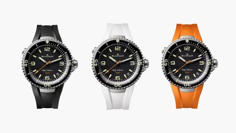 Blancpain Fifty Fathoms Tech 5029 dive watch with brushed titanium case, black dial, ceramic bezel, and bold orange rubber strap—combining professional diving specs with refined lifestyle appeal.