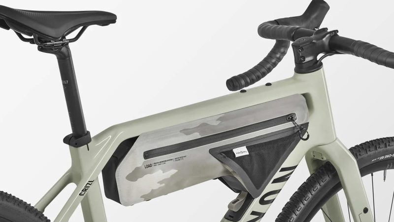Canyon Grizl CF 6 carbon gravel bike with integrated fork mounts, tubeless tires, and endurance geometry designed for off-road adventure riding.