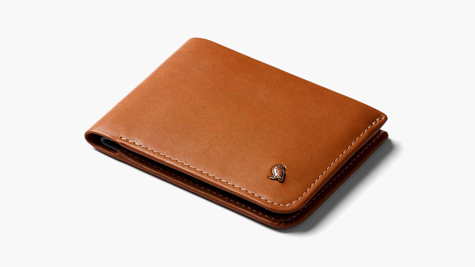 Polished leather bifold with stitched details—classic refinement in best minimalist wallets for men 2025.