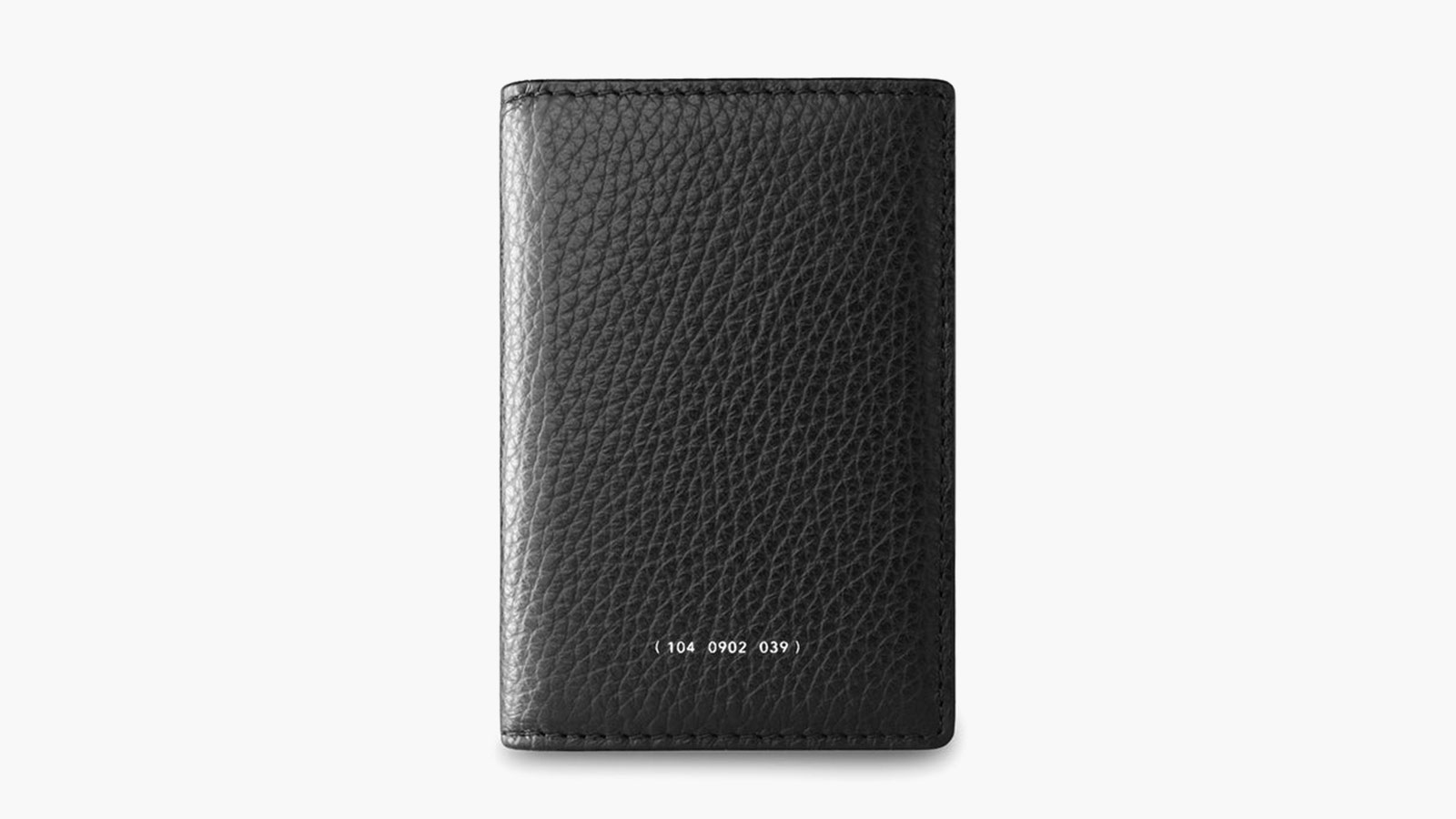 Grained leather vertical wallet with discreet numbering—elevated essential for best minimalist wallets for men 2025.
