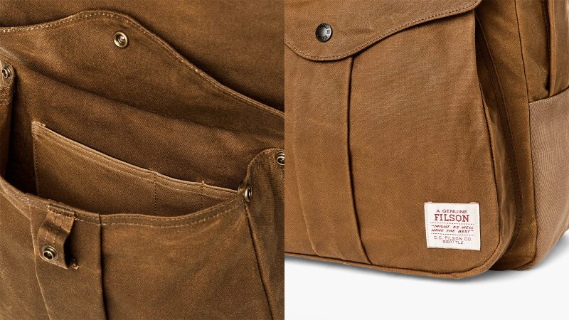 The Filson Journeyman Backpack is crafted from durable Tin Cloth construction, with a padded laptop sleeve, and classic leather detailing for rugged elegance.