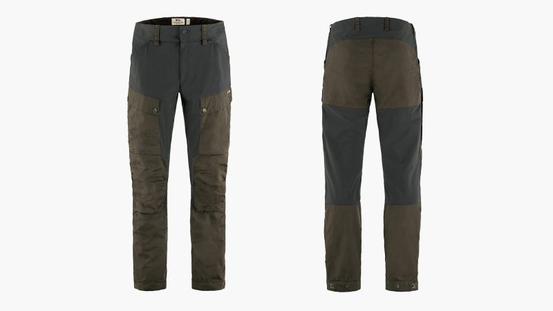 The Fjällräven Keb Trousers feature stretch fabric, G-1000 reinforcement, thigh ventilation zippers, and dual leg pockets—making them ideal for technical trekking and all-season mountain use.