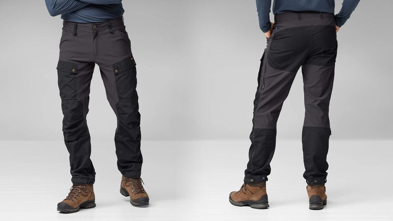 The Fjällräven Keb Trousers feature stretch fabric, G-1000 reinforcement, thigh ventilation zippers, and dual leg pockets—making them ideal for technical trekking and all-season mountain use.
