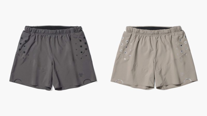 Goldwin 0 Performance Capsule with trail-inspired shirts, shorts, compression tights, and a minimalist trail pack, designed for summer trail running.