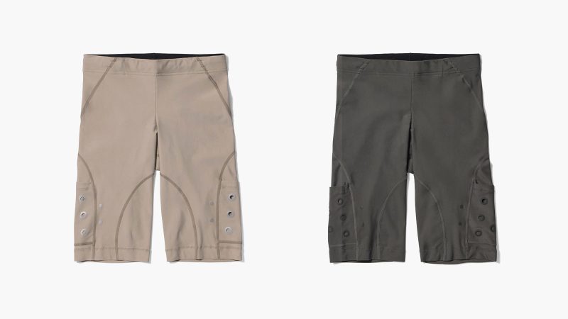 Goldwin 0 Performance Capsule with trail-inspired shirts, shorts, compression tights, and a minimalist trail pack, designed for summer trail running.