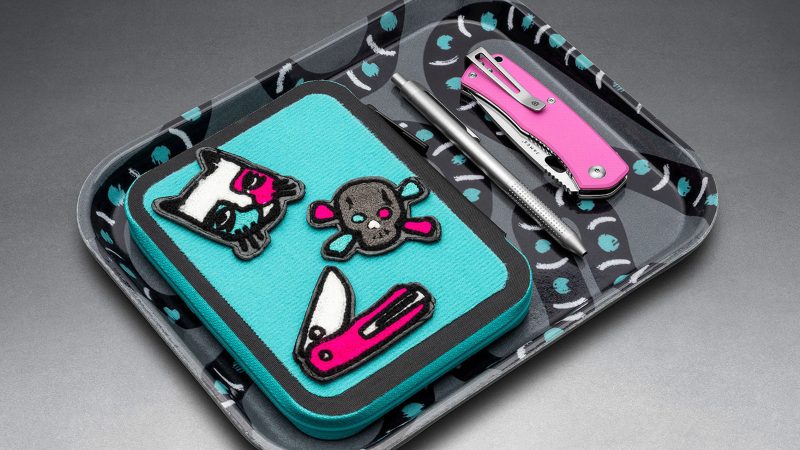 The James Brand × Mark Oblow Artist Series utility knife, EDC notebook sleeve, and graphic tee featuring skate-inspired design and West Coast street art.